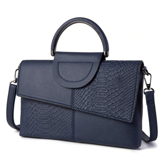 Luce vegan leather clutch